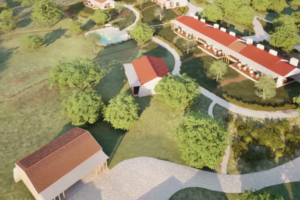 Imagem 3D vista de cima de duas casas e do edifício comprido